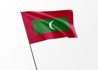 Maldives flag flying high in the isolated background Maldives independence day