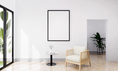 The living room consists of a sofa chair and a picture frame on the wall.