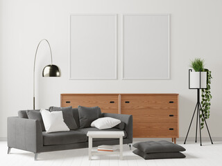 The living room consists of a sofa chair and a picture frame on the wall.