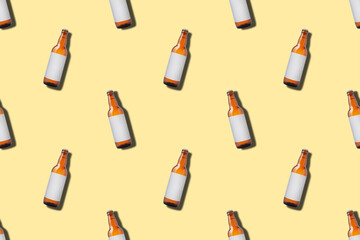 Seamless pattern with glass beer bottle on yellow background. Minimal style, flat lay