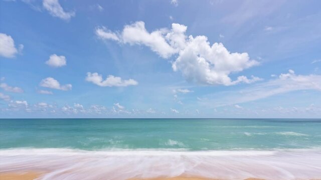 Blue sky with fluffy clouds background Clear blue Sky with cloudy in good weather day Summer sunny day with wave crashing on beach White clouds flowing in clear sky Amazing seascape