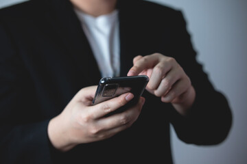 businessman using a mobile smartphone. Communication, online network, telecommunication technology concept.