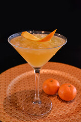 chilled cocktail glass wine with mandarin orange fruit juice kombucha bar alcohol drink menu