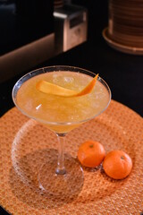chilled cocktail glass wine with mandarin orange fruit juice kombucha bar alcohol drink menu