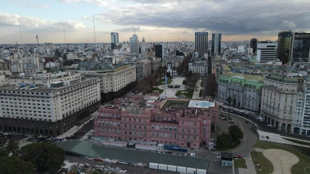 4K Aerial view showing famous Casa Rosad,the office of the President of Argentina at Plaza de Mayo in Buenos Aires during sunset.