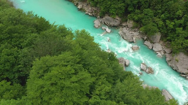 Aerial &ndash; Drifting next to a beautiful emerald river in Soča Valley