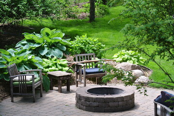 a fire pit in an idyllic, quiet backyard