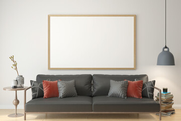 The living room consists of a sofa chair and a picture frame on the wall.