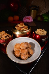 Chinese new year festival freshly baked assorted cookies group set with pineapple , almond, chocolate , walnut, peanut and spicy shrimp roll