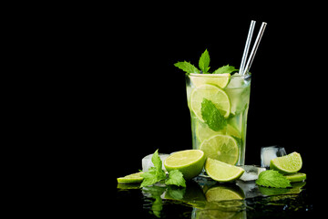 Glass of Fresh Mojito Cocktail - studio shot on black background