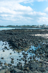 black rock in transparency water