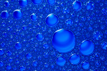 Water drops on blue background