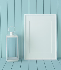 photo frame and lamp on cyan wooden background