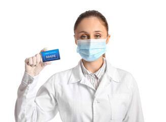 Female doctor with vaccination card on white background