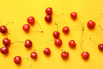 Obraz na płótnie Canvas Tasty ripe cherry on color background