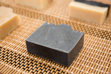 Close up shot of black charcoal hand made milk soap 