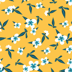 white flowers and teal leaves pattern on yellow