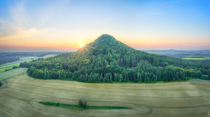 Aerial view of Ostrzyca Proboszczowska - extinct volcano, or rather a volcanic chimney located in...