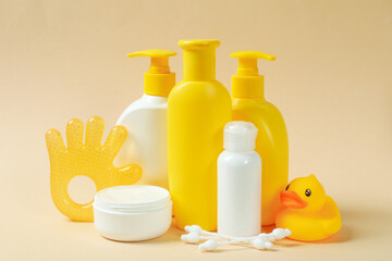 Obraz na płótnie Canvas Different baby hygiene accessories on beige background