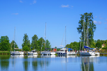 Fototapeta na wymiar Boats at a dock on a beautiful sunny summer day