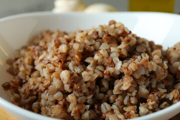 Concept of tasty eating with buckwheat, close up