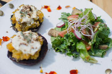 vegan food, grilled mushrooms and salad
