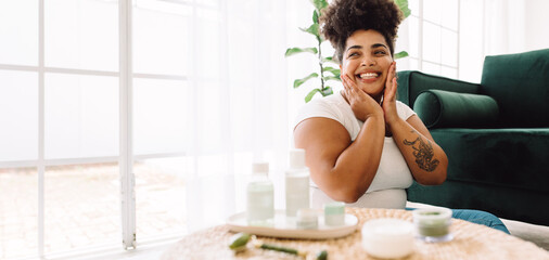 Woman smiling after skin care at home