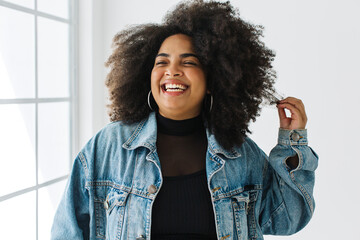 Beautiful woman smiling in demin jacket
