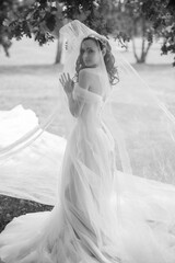 Fototapeta na wymiar Tender elegant young bride in pink pastel wedding dress, fashionable fancy collection