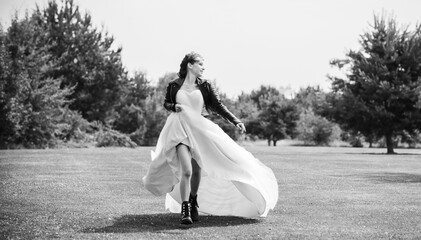 Tender elegant young bride in pink pastel wedding dress, fashionable fancy collection