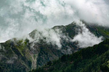 Fototapeta premium clouds over the mountains 