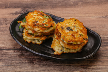 Zucchini pancakes with herbs and spices