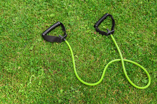 Fit tube on the green grass background