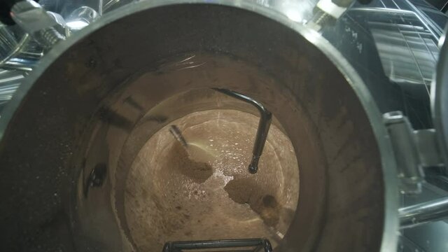 Modern craft brewery. Craft beer production. Modern equipment in brewery, metal tanks, alcoholic drink production