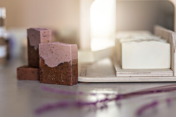 Layout and packaging of fresh prepared handmade soap and cosmetics for body skin care. Home spa. Small business