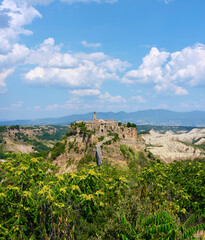 Fototapeta na wymiar Civita di Bagnoregio, city of culture, located in the valley of the badlands. City of Etruscan origin, also known as 