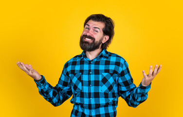 this is a great day. casual male fashion look. happy handsome hipster. barbershop. mature man has moustache. bearded man in checkered shirt. brutal guy with emotional face