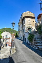 A small street between the old houses of Sant'Angelo d'Alife, a mountain village in the province of...