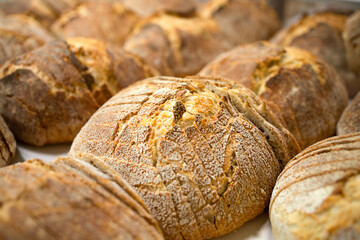 Freshly baked bread. Industrially made baked goods. Selective focus