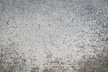 Wall flakes. Old rough stone on cement pattern wall background. Vintage grunge plaster or concrete stucco surface. Montage product design concept.