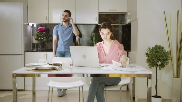 A husband doesn't let his wife to concentrate on her work because of his talking 