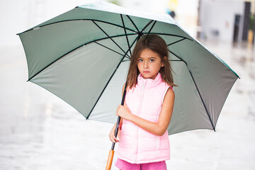 small girl with an umbrella