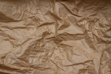  crumpled paper. craft paper. texture, background, folds.brown crumpled paper