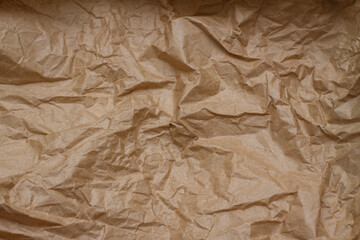  crumpled paper. craft paper. texture, background, folds.brown crumpled paper