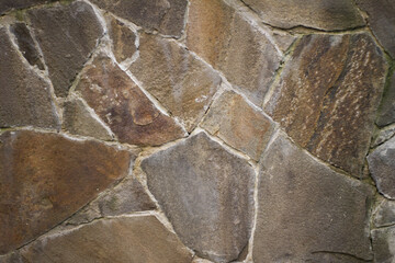 a natural stone. wall, foundation. masonry. large stone