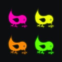 Bird Eating Seeds four color glowing neon vector icon