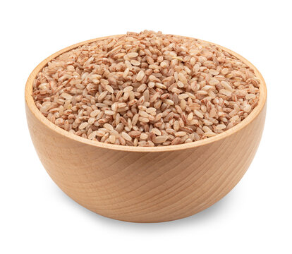 devzira rice in wooden bowl isolated on white
