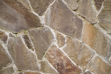a natural stone. wall, foundation. masonry. large stone