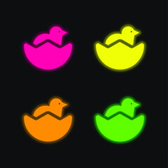 Baby Chicken And Half Egg Shell four color glowing neon vector icon
