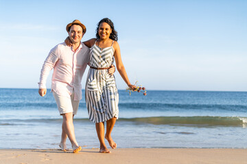 Young couple enjoying time together on the beach